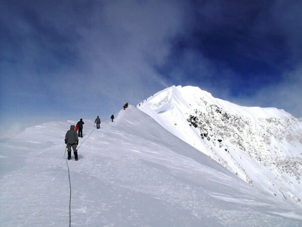 Climbers in the snow on a mountain